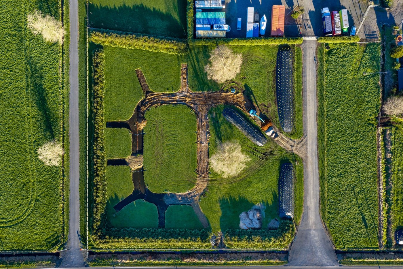Aerial view of Waypoint Hamilton campground under development, showing the loop road and site layout